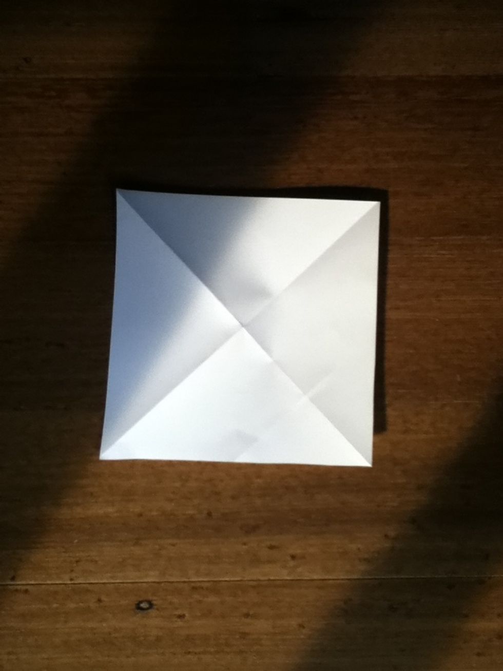 Now open up your paper, so it looks like a square