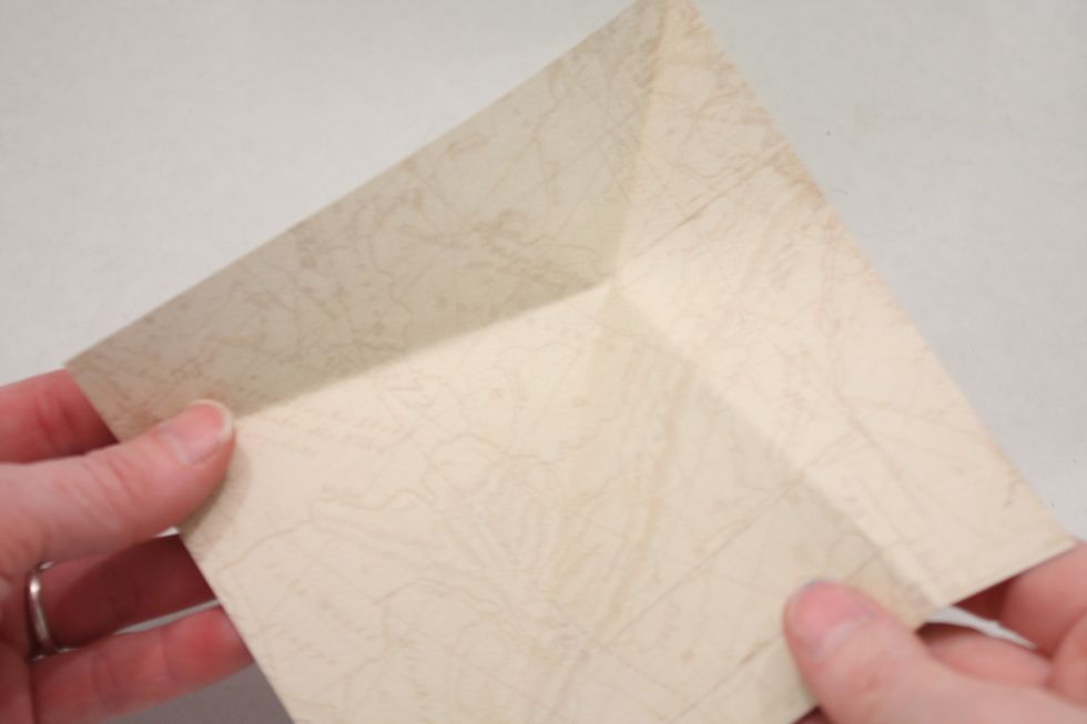 Now open your paper back up and turn to the other side. You can see the folds we just made