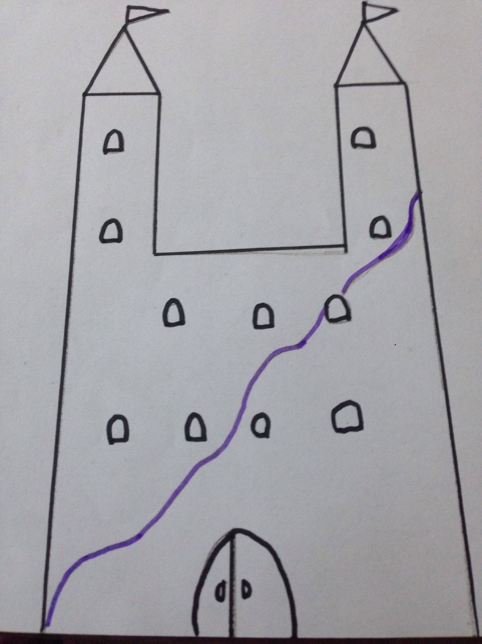 Now outline the castle with black sketch pen and decorate it