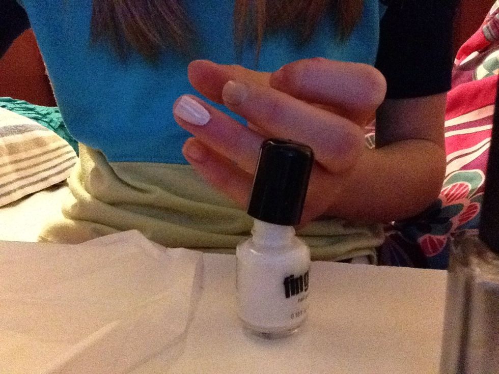 Now paint both of your ring fingers one coat...