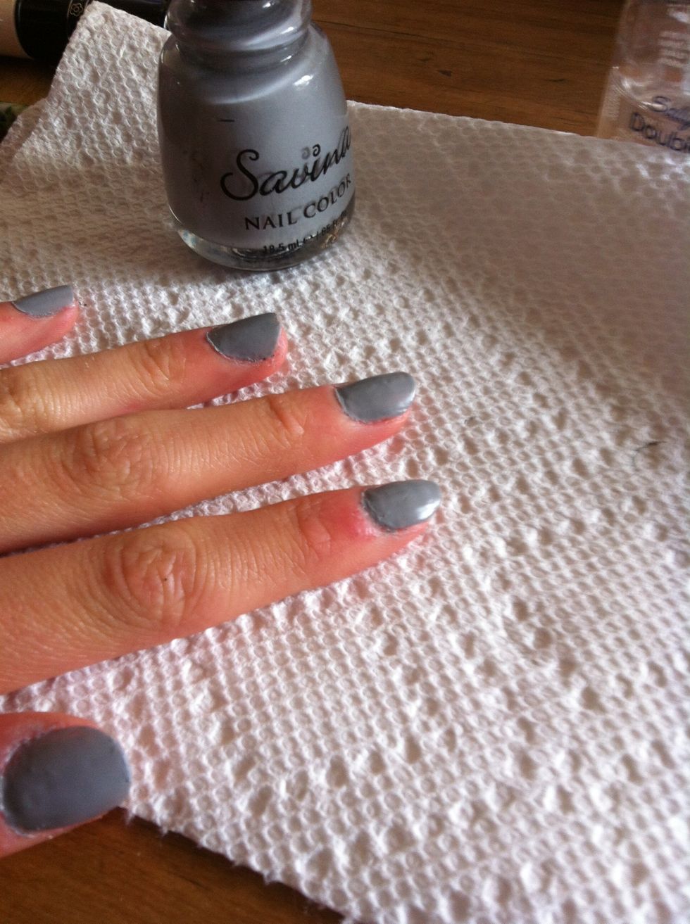 Now, paint on a medium-dark polish. Use as many coats as you need.