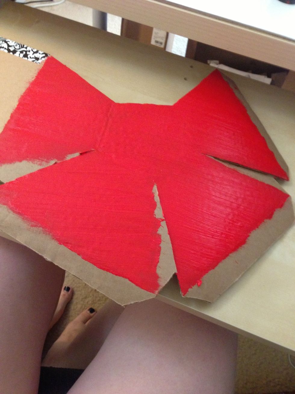 Now paint the outside of the pocket. Try to keep the edges clear of paint so that the glue will adhere more easily.