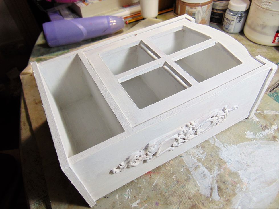 Now paint the whole thing again in a white acrylic paint. This is the final paint layer.
