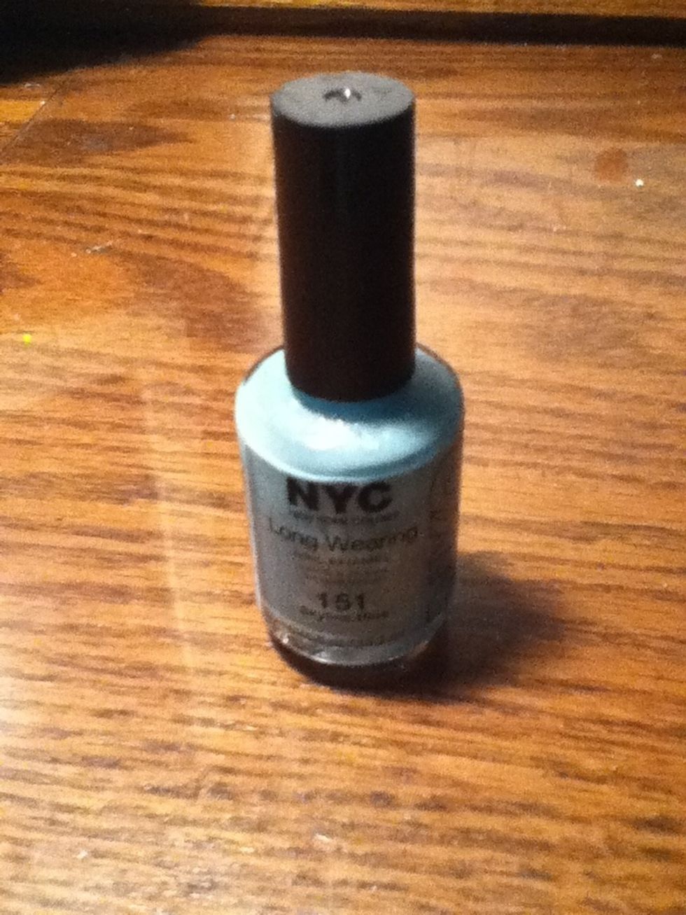 Now, paint your index and ring fingers with the lighter shade of blue. Be sure it is completely dry before moving on.