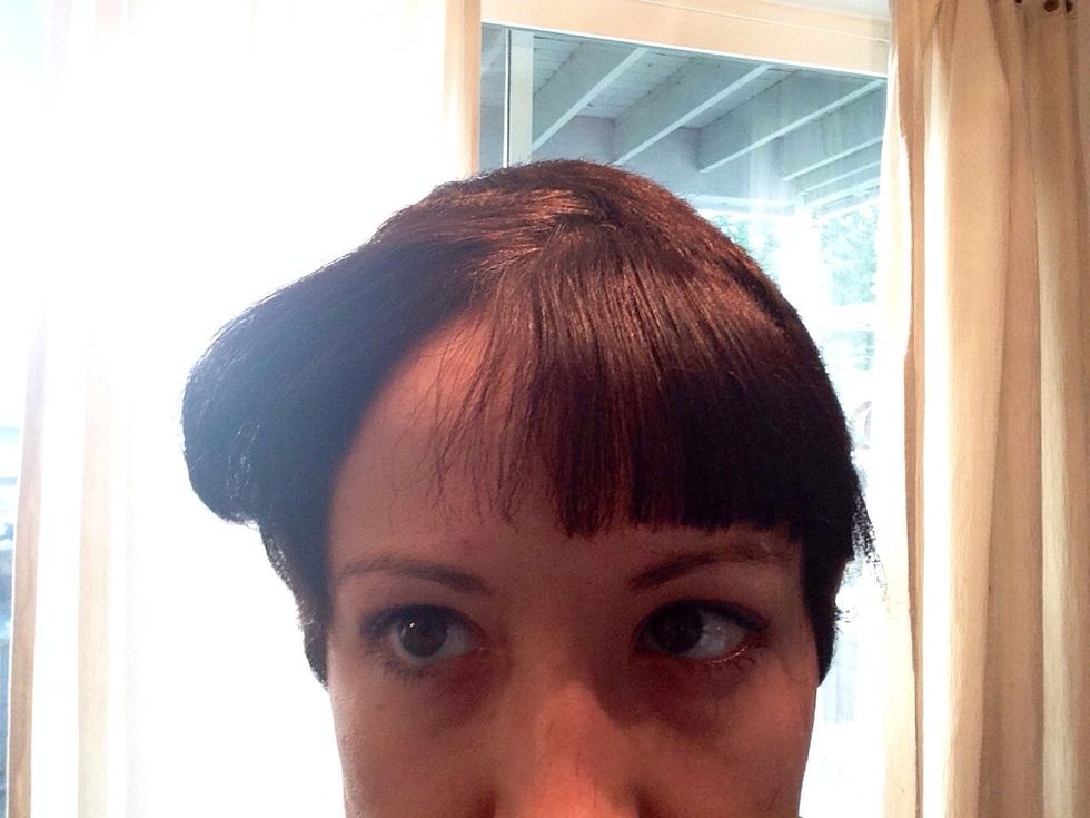 Now part bangs and start from one side slowly cutting.