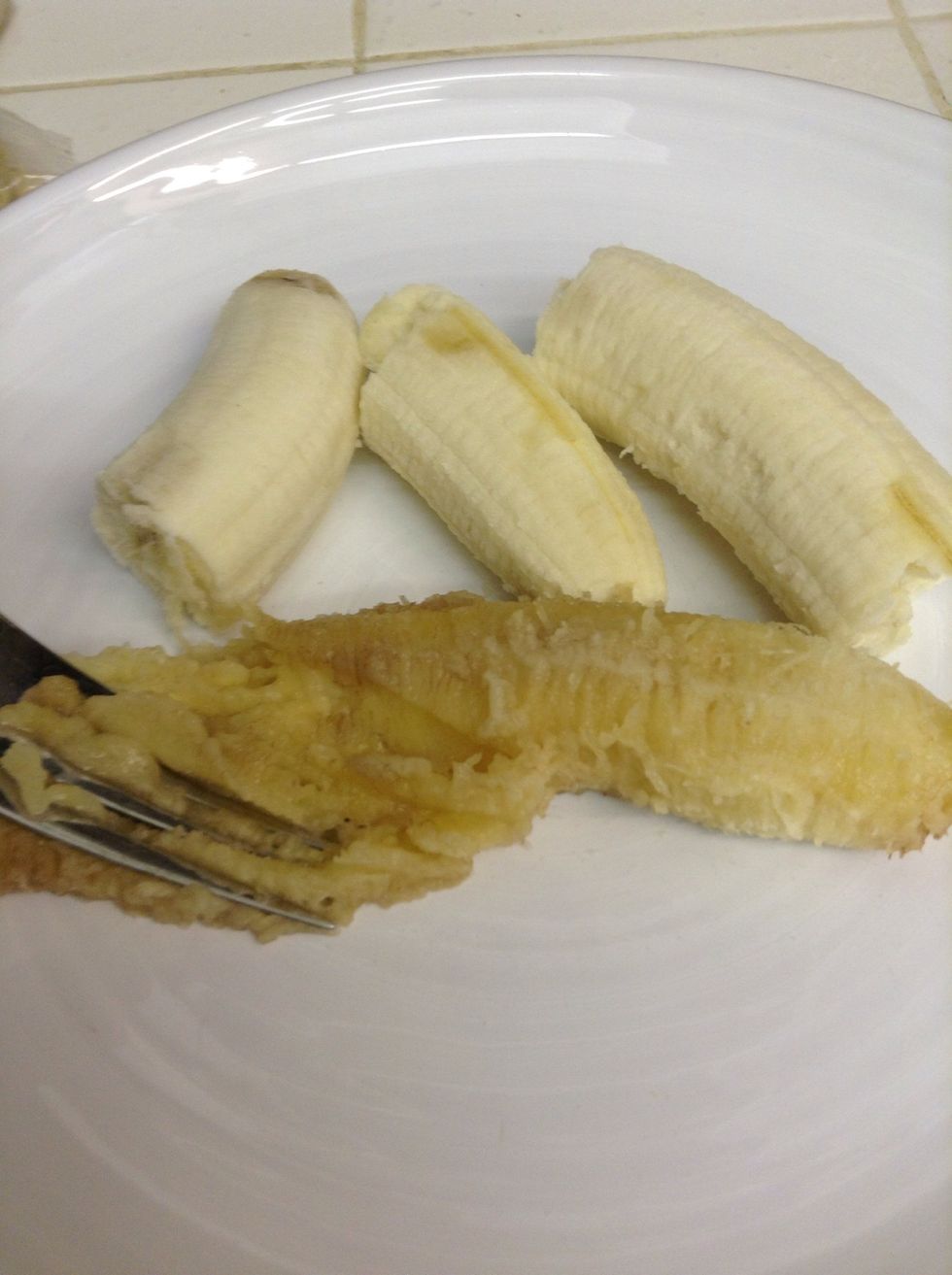 Now peel and mush the bananas.