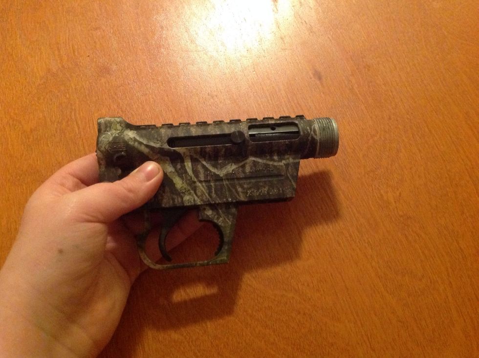 Now pick up the receiver, which is the squarish thing with the trigger on it.