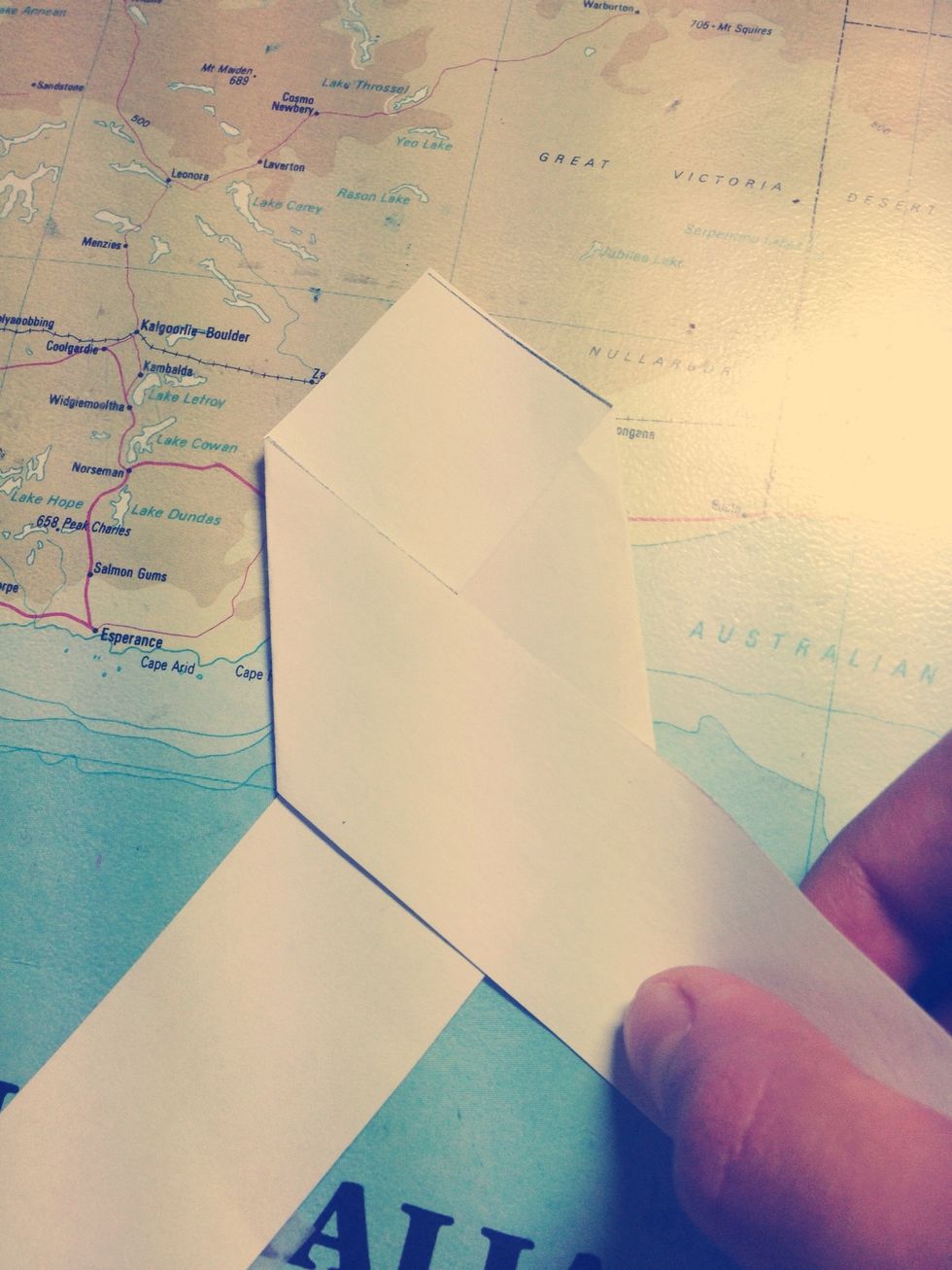 Now pick up the strip you just folded.