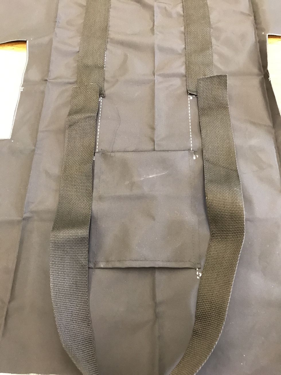 Now pin the other half of the strapping on the other side. Overlap the strapping by about one inch on each side