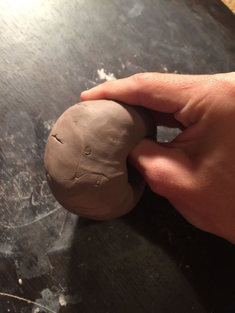 Now pinch the clay sides.