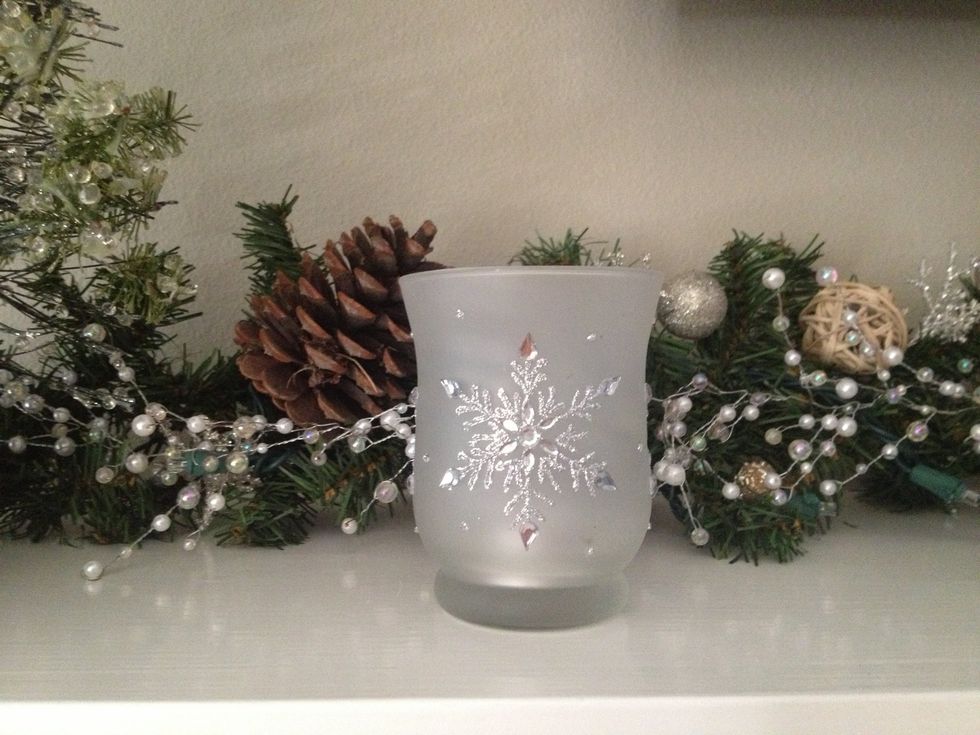 Now, place a few pretty votives in front of your garland. Use whatever colors, shapes, sizes you like!