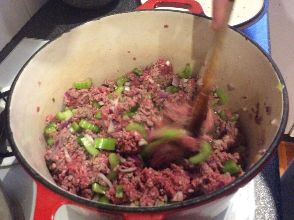 Now place in the pot all the vegetables we cut earlier and stir.