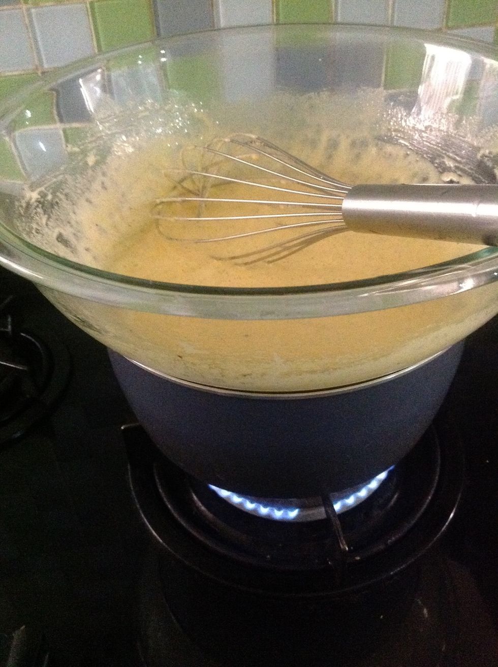 Now place the mixture above the pot with simmering water. Whisk for 10 minutes. You have to make sure the water never touches the bottom part of the bowl.