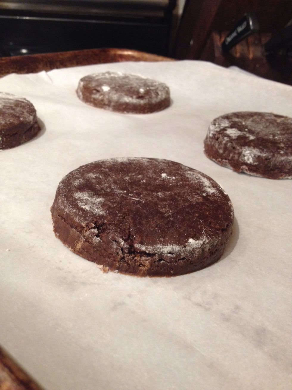 Now place them on a cookie sheet lined with parchment paper. No more than 6 cookies per sheet as they tend to puff up.