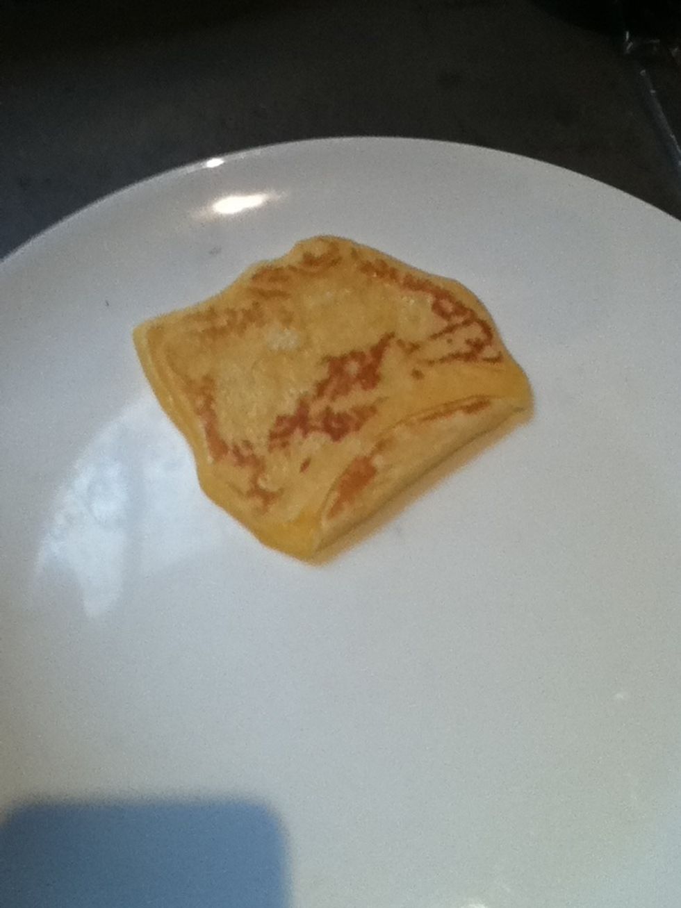Now place this pancake on a large plate to let it cool
