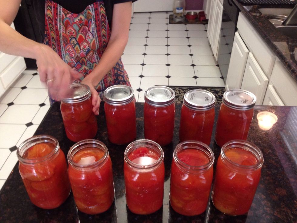 Now place your lids & rings onto each jar. Tight enough to be fitted on. Do not over twist.