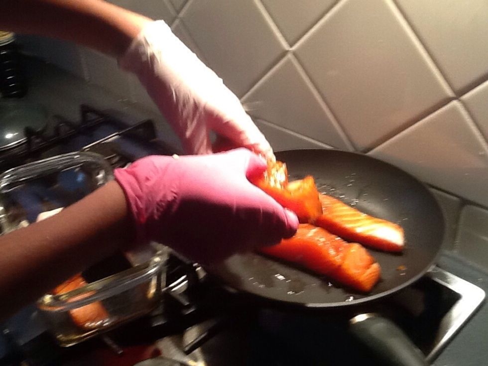 Now place your salmon on the pan leaving a bit of space between each.
