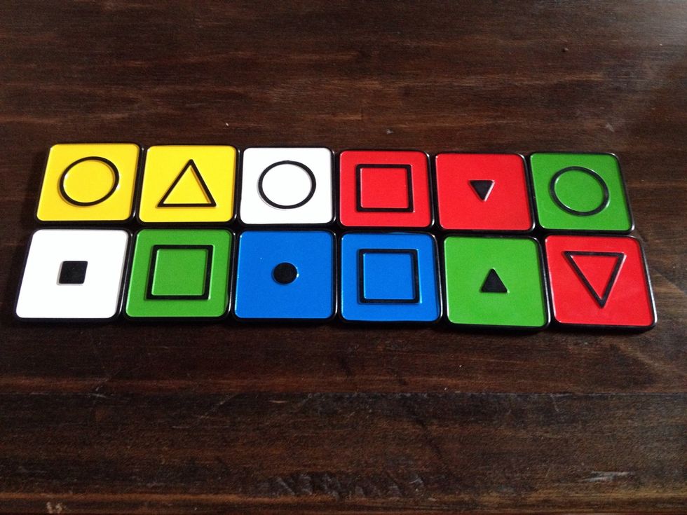 Now play with two rows. Introduce concept of moving tile horizontally or vertically if tiles share ONE characteristic.