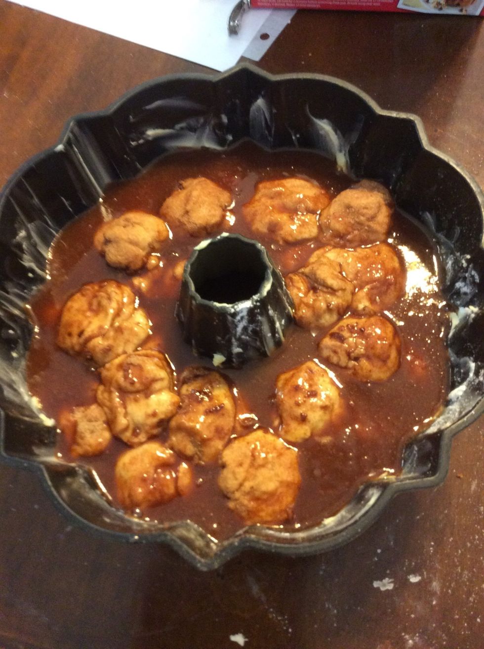 Now pour it in with the Monkey Bread. Don't worry about your monkey it is supposed to look like its drowning. It won't be for long. \ud83d\ude04\ud83d\ude04\ud83d\ude04\ud83d\ude04\ud83d\ude04\ud83d\ude04\ud83d\ude04\ud83d\ude03\ud83d\ude03\ud83d\ude03\ud83d\ude03\ud83d\ude03\ud83d\ude09\ud83d\ude09\ud83d\ude09\ud83d\ude09. Lol