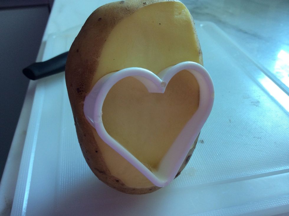 Now, press a cookie cutter into the flesh. \u2764\ufe0f