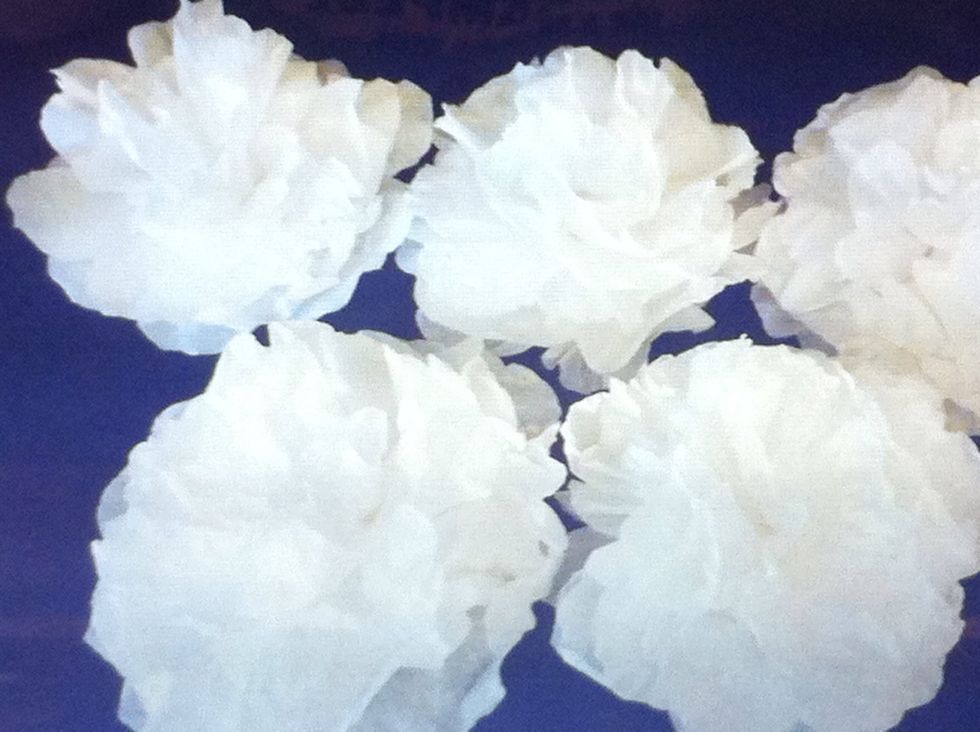 Now puff the ball out and you will get a nice looking flower. Work with each layer until you like the way it looks.