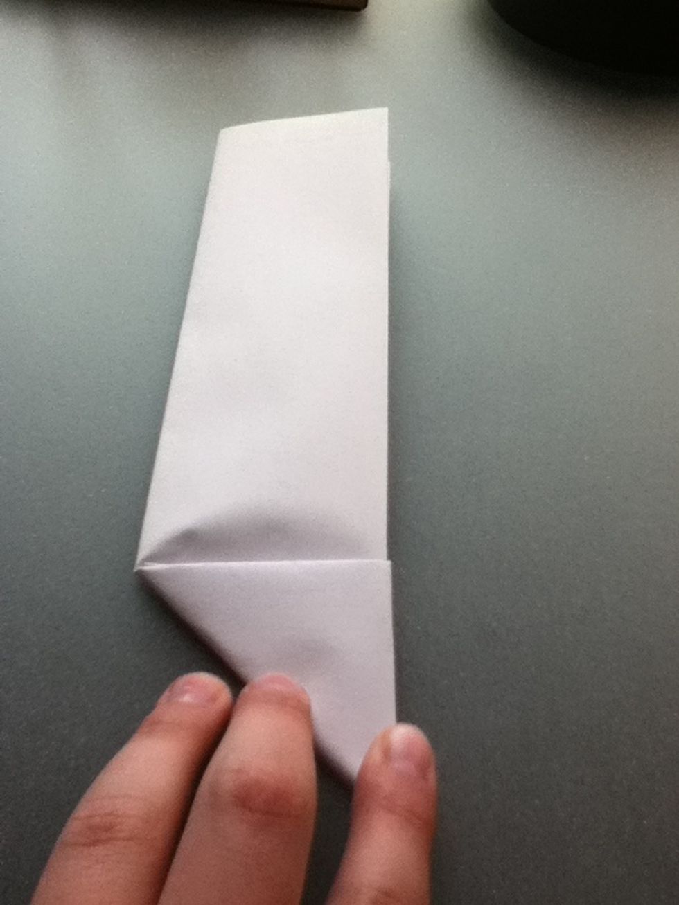 Now pull the tip of the triangle right.