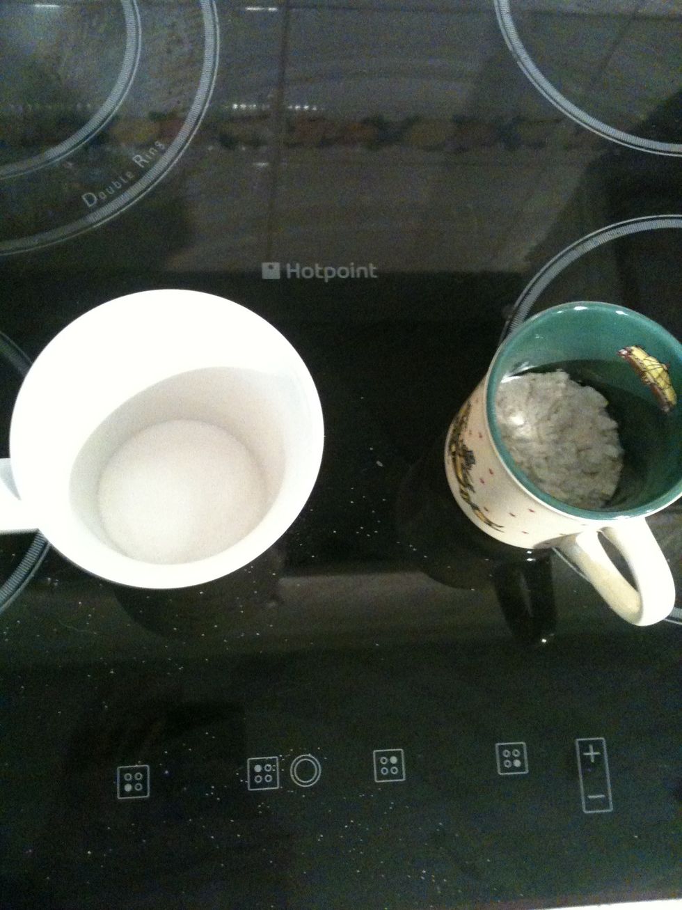 Now put 1/4 mug of flour in the mug.