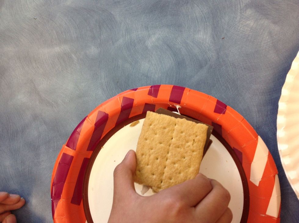 Now, put a another graham cracker on top.