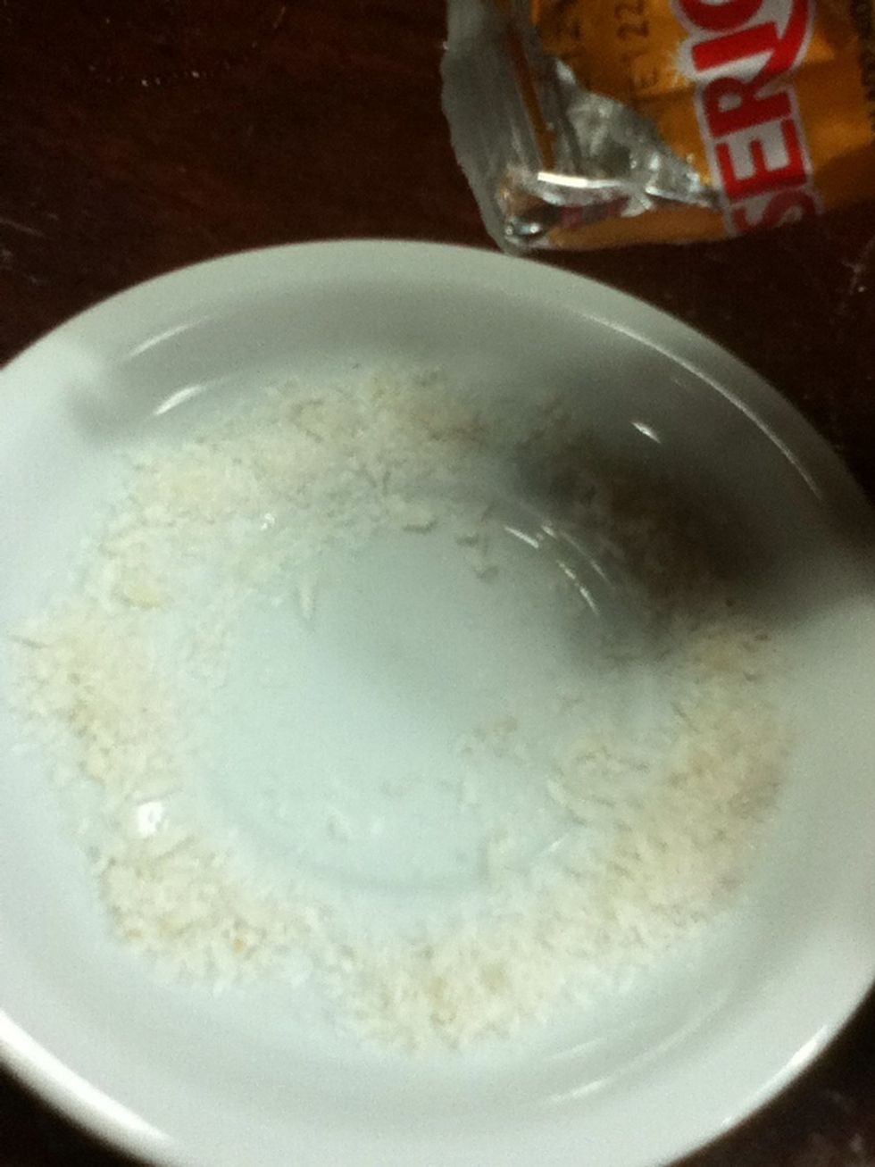 Now, put a bit of the coconut in a plate...