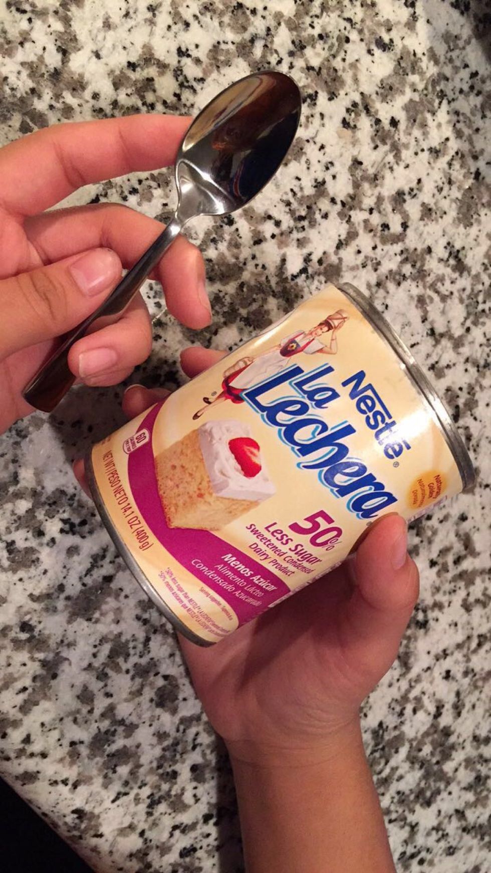 Now, put a teaspoon of condensed milk in the tea and mix