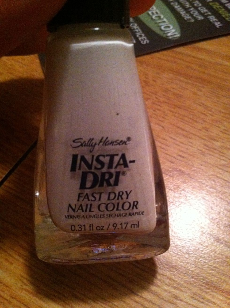 Now put a white nail polish on preferably two coats.