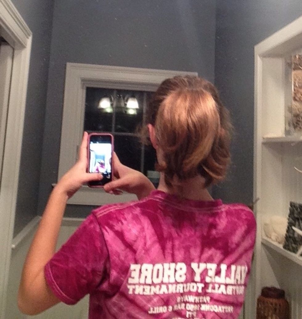 Now put it into a ponytail. I prefer a high ponytail but wherever you place it on your head will work with this strategy of bun making.