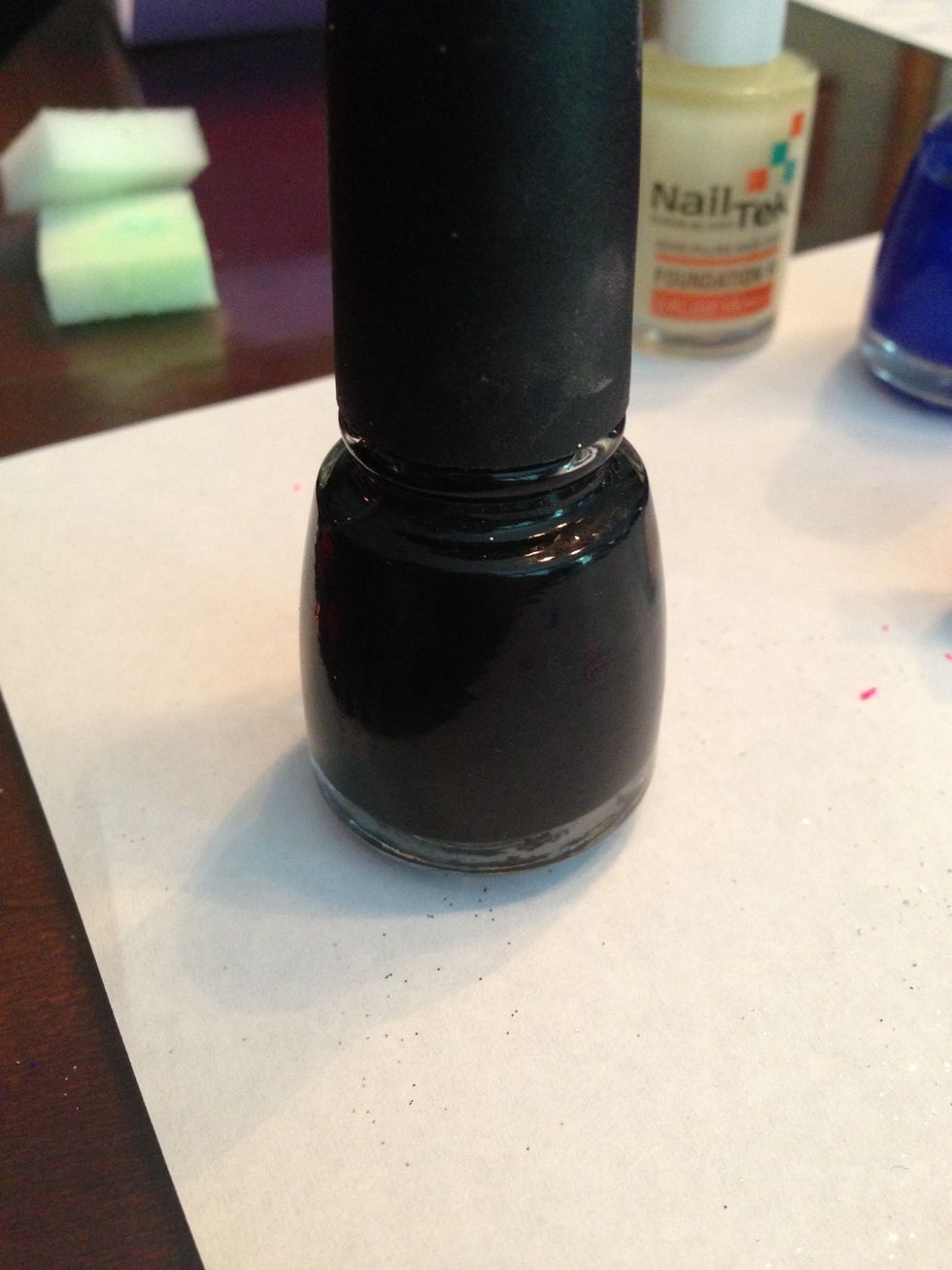 Now put of two coats of black nail polish