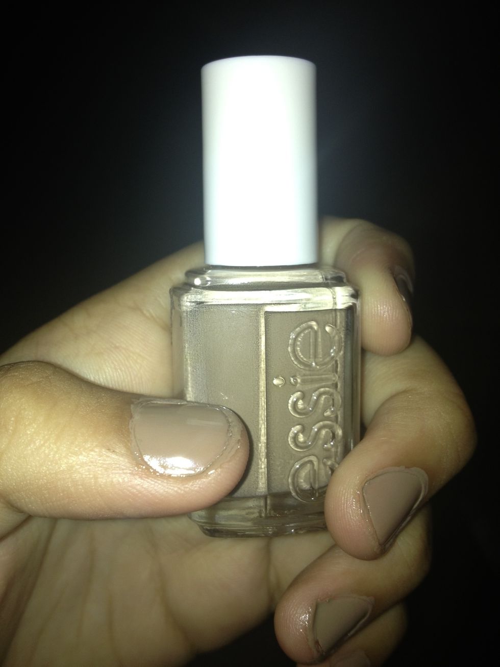 Now put on a coat of your light nail polish. I prefer nude because it lets the designs on your nails pop out, but you can use any other color as long as it is light.
