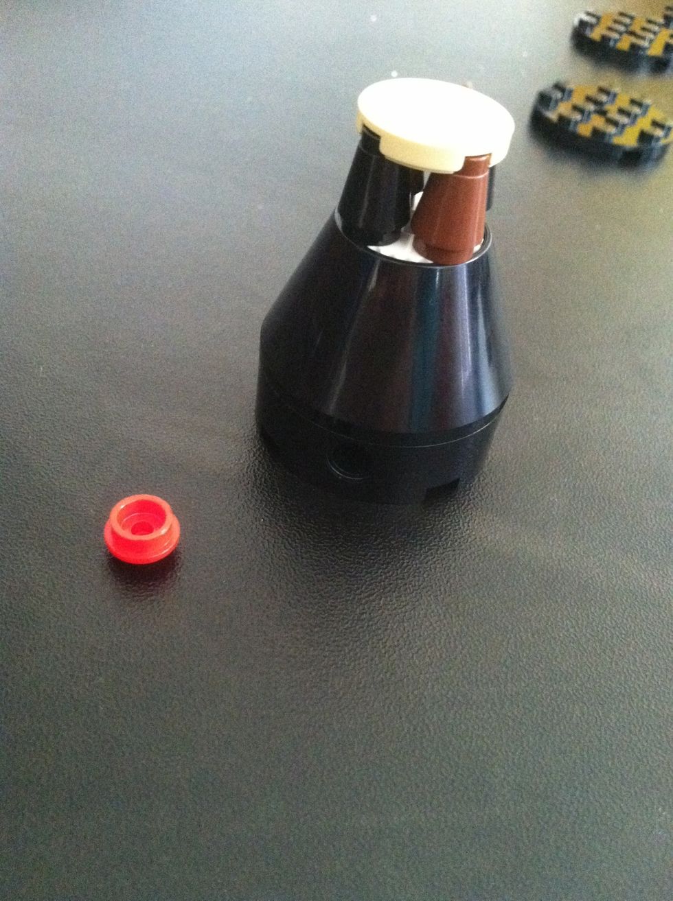 Now put small red piece in the hole