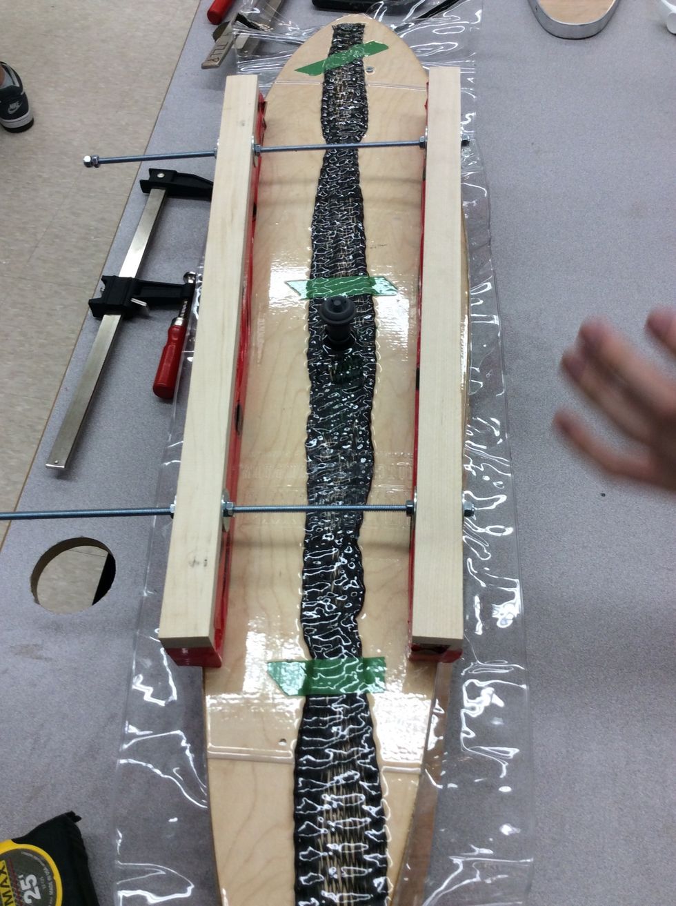 Now put the clamping cull on top to help get a curve in the board