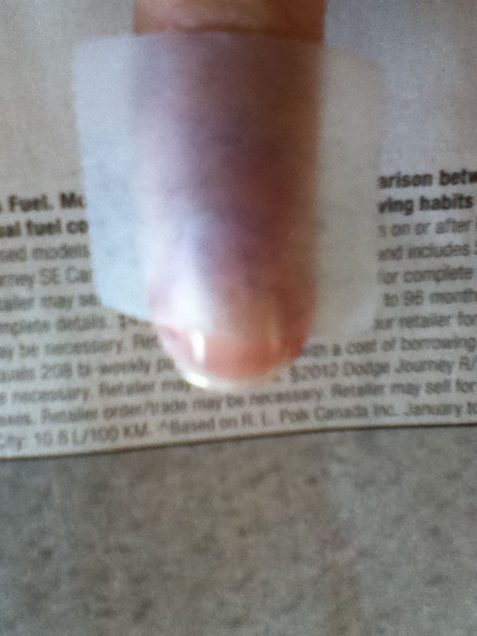 Now put the tape on the nail, when it's dry