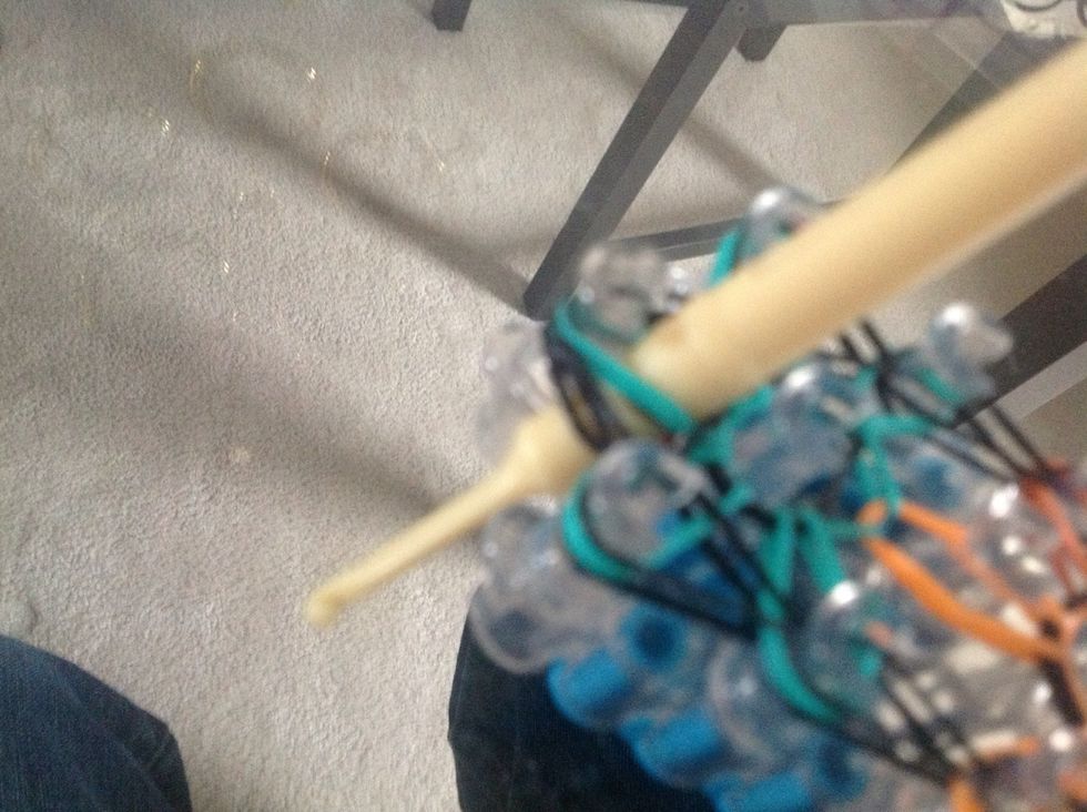 Now put your hook through all the band on the other side of the loom