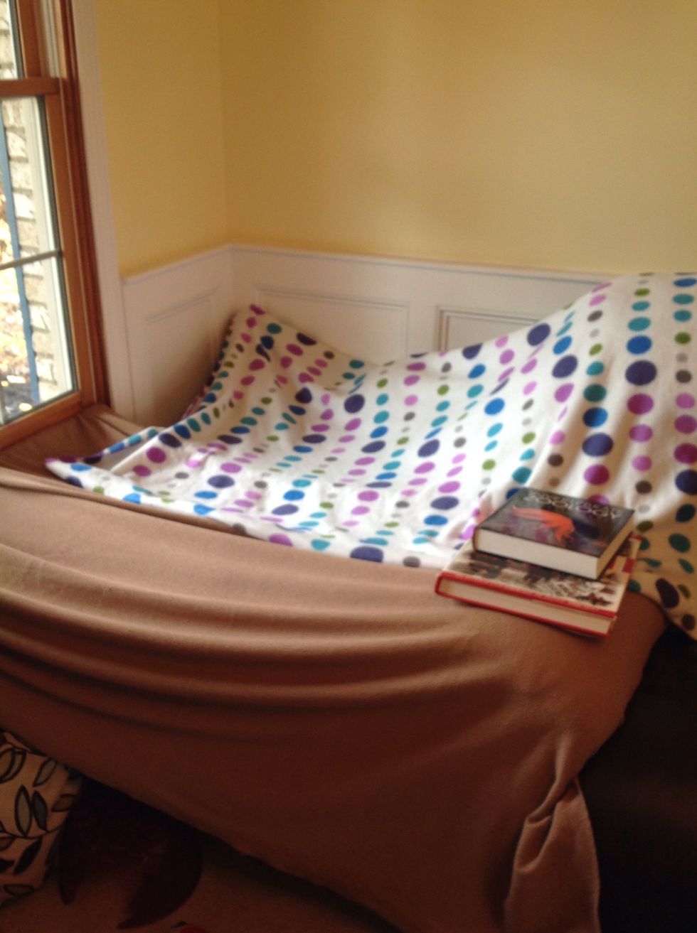 Now put your second blanket on. You may need some heavy books and duck tape to secure.