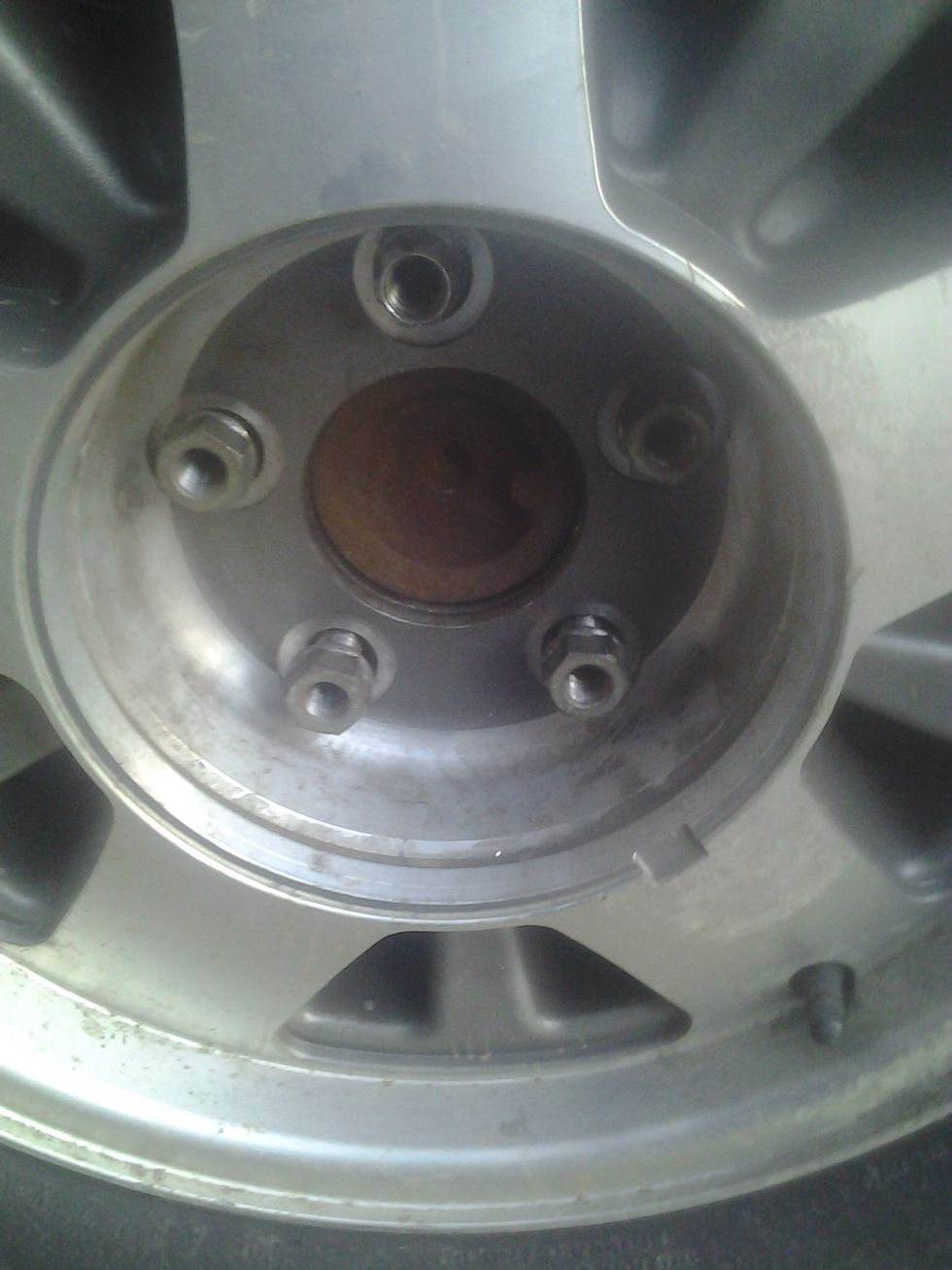 Now put your spare on and make sure you put your lug nuts back on the wheel just as tight or tighter.