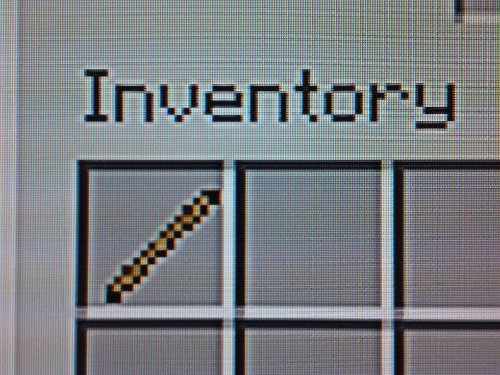 Now put your stick in your inventory. But leave out your torches.