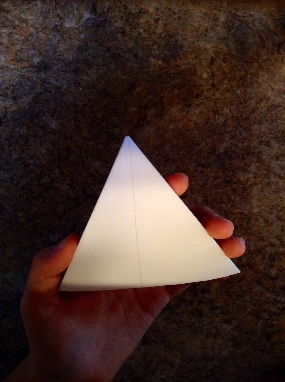 Now refold it and draw a line down the middle.