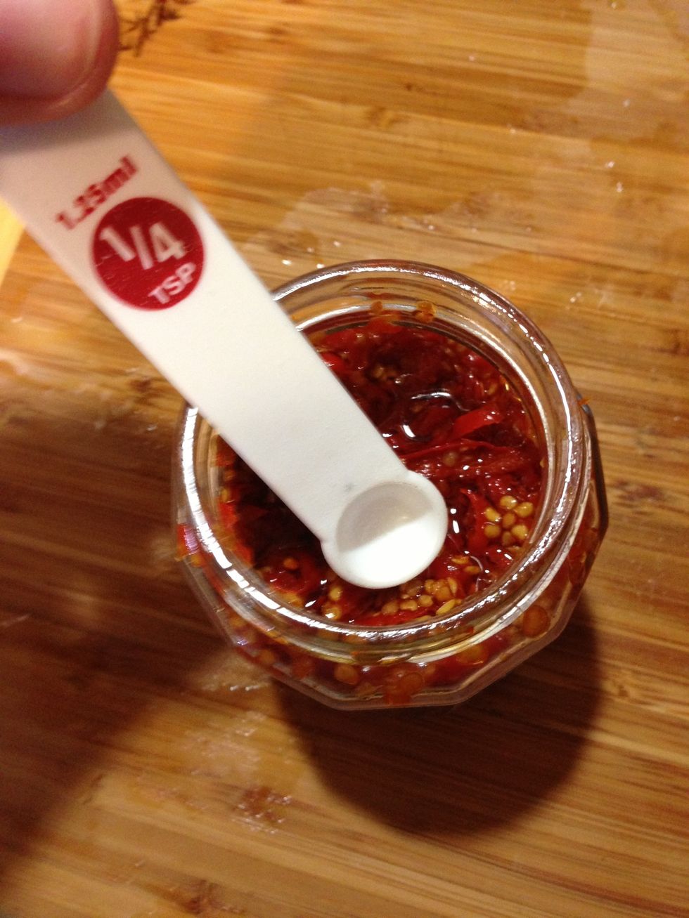 Now, remember that kick? Using a very small quantity receptacle, such as 1/4 teaspoon, slowly approach your chilies.