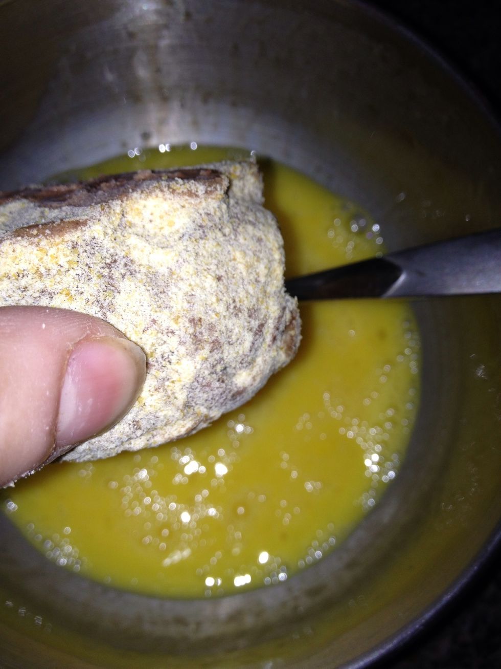 Now remove the frozen balls from freezer and coat with the eggs very well