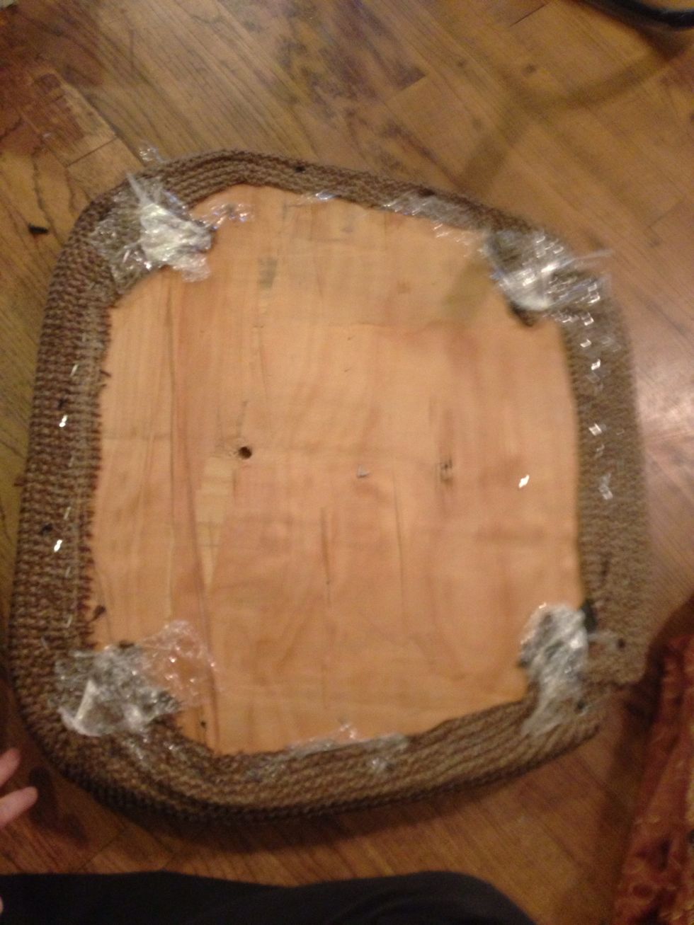 Now remove the seat fabric taking out as many staples as you can.