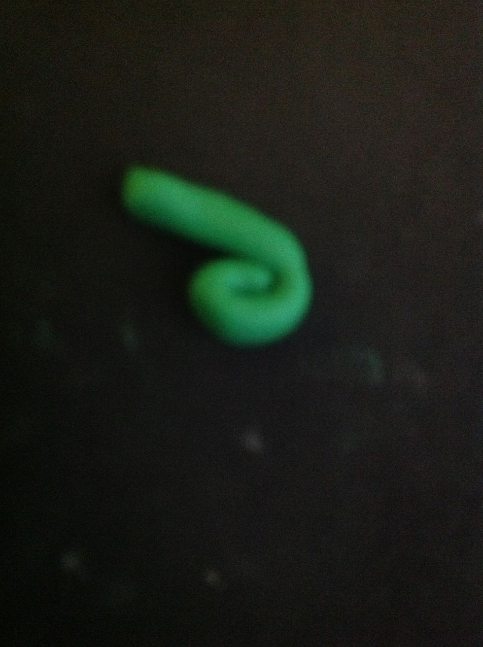 Now roll a string out and curl the end in.