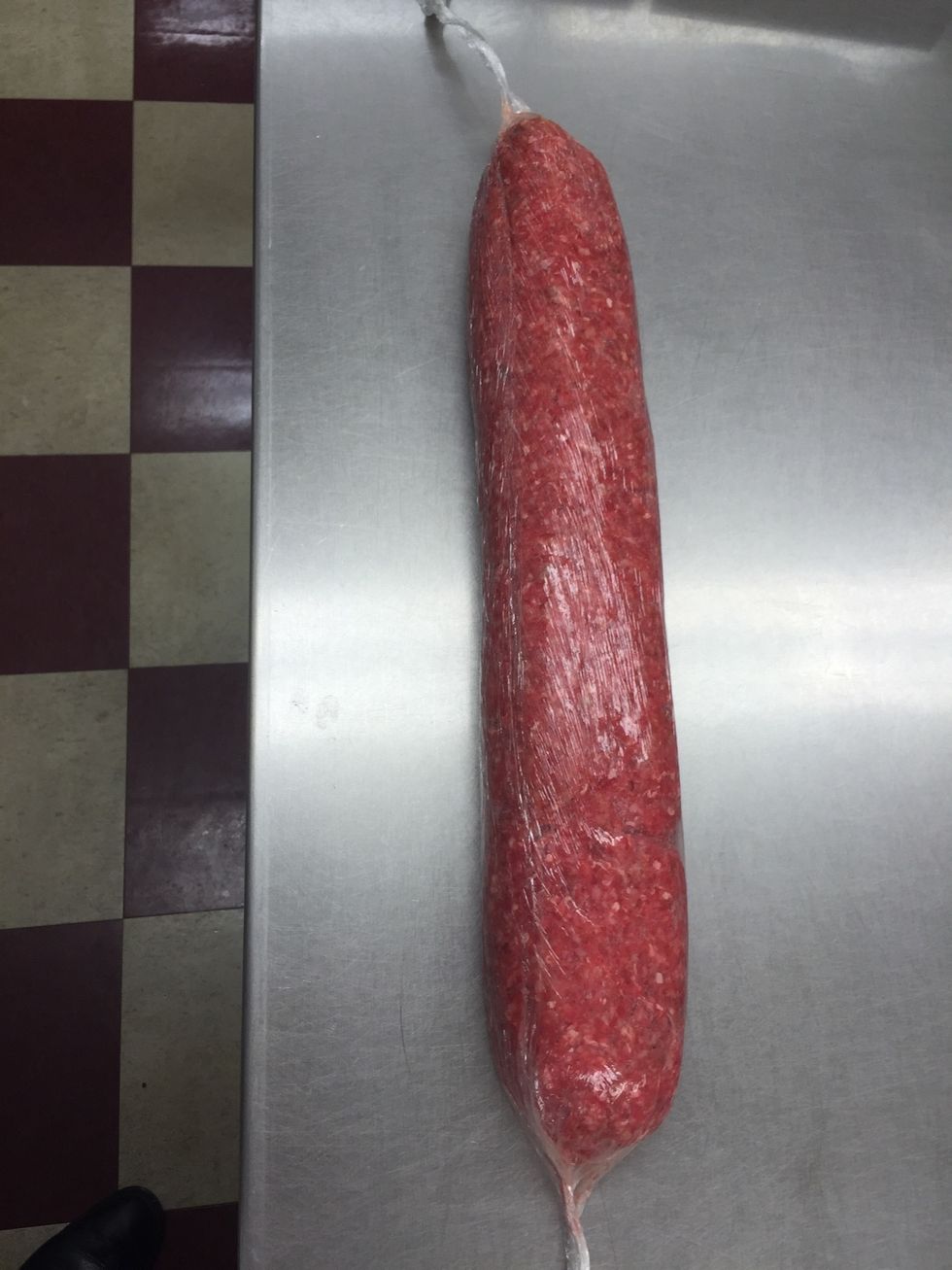 Now roll it up! Don't pretend you don't know what I am talking about, mash all the air out it and squeeze the ends to keep it together.