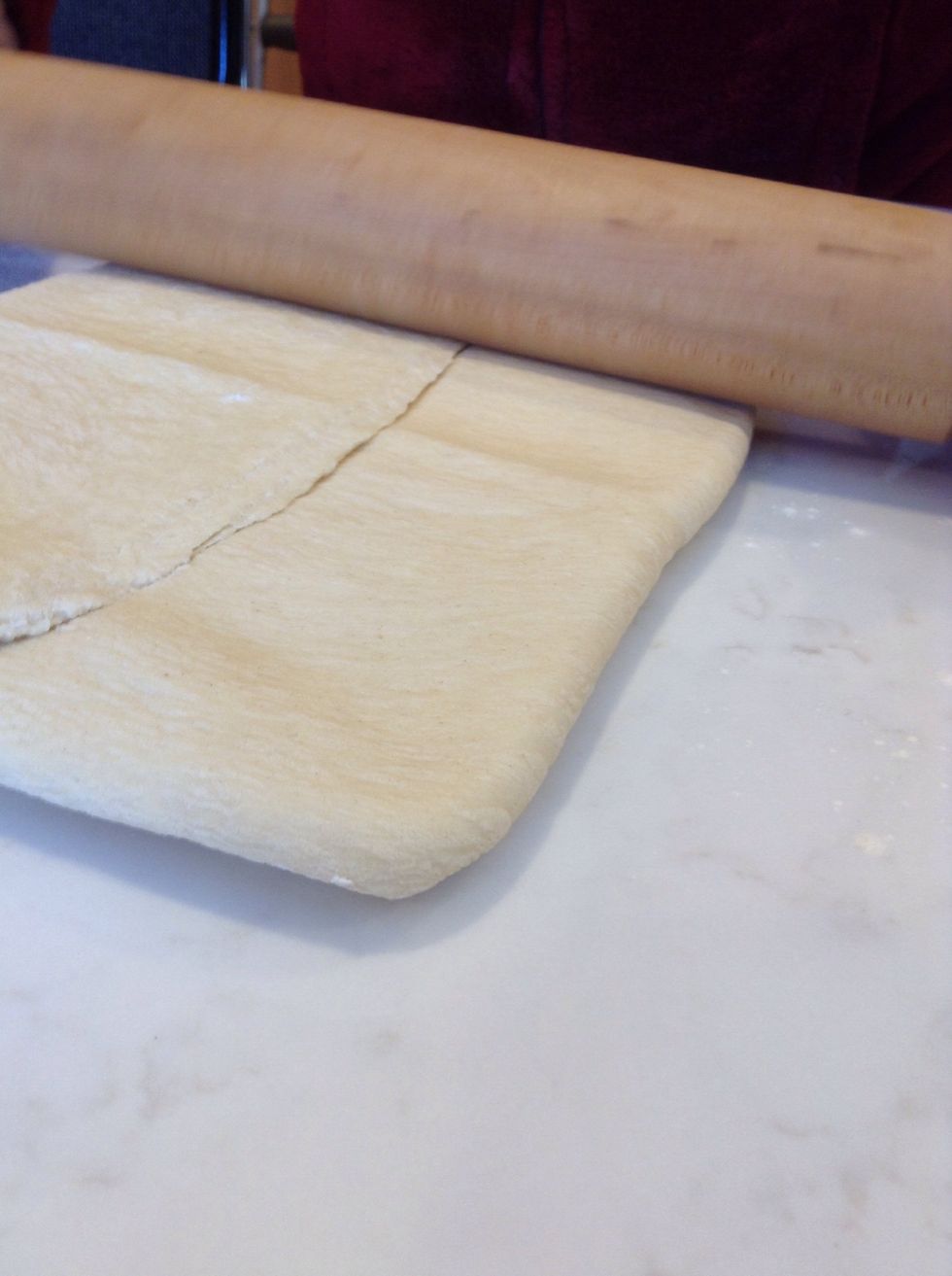 Now roll the butter and dough out into a 9 by 18 inch rectangle