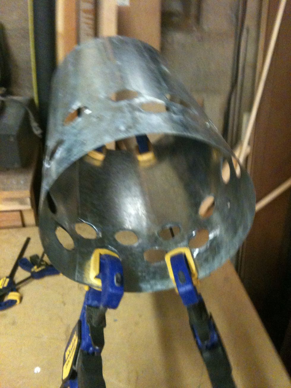 Now roll the tin to your desired size. I went with about a 7" chimney. The first one I made was a 5" diameter and I found it was too small.