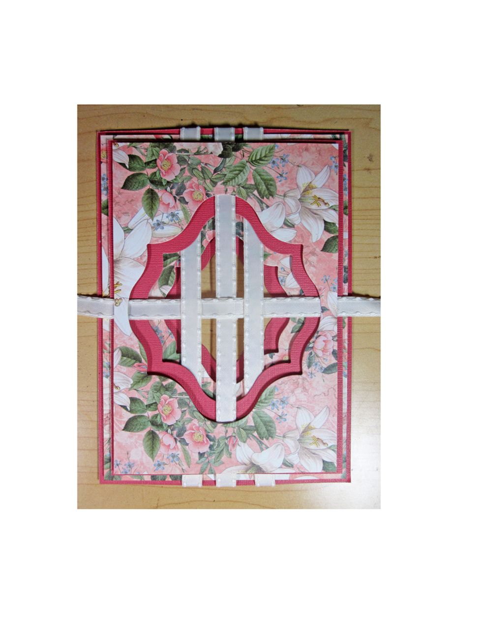 Now rub ribbon from the side and weave it under and over the existing ribbon.